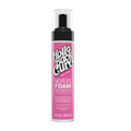 Pink 10oz bottle of Holla Back Curl No Fuss Medium Hold Foam with a pump top